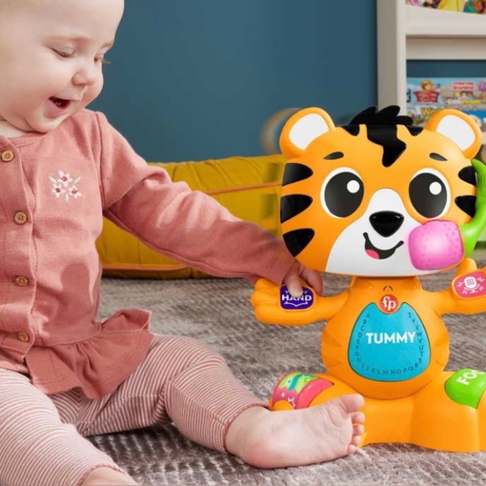 The Fisher-Price Link Squad
Bop & Groove Tiger Baby Learning Toy.